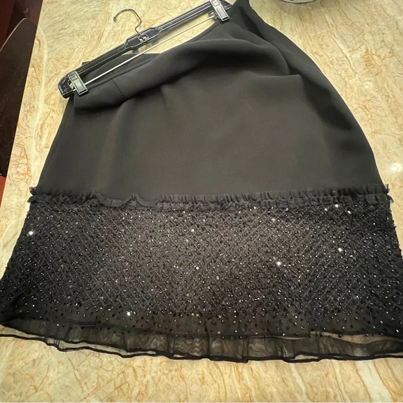 Chic Black Midi Skirt with Embellished Hem